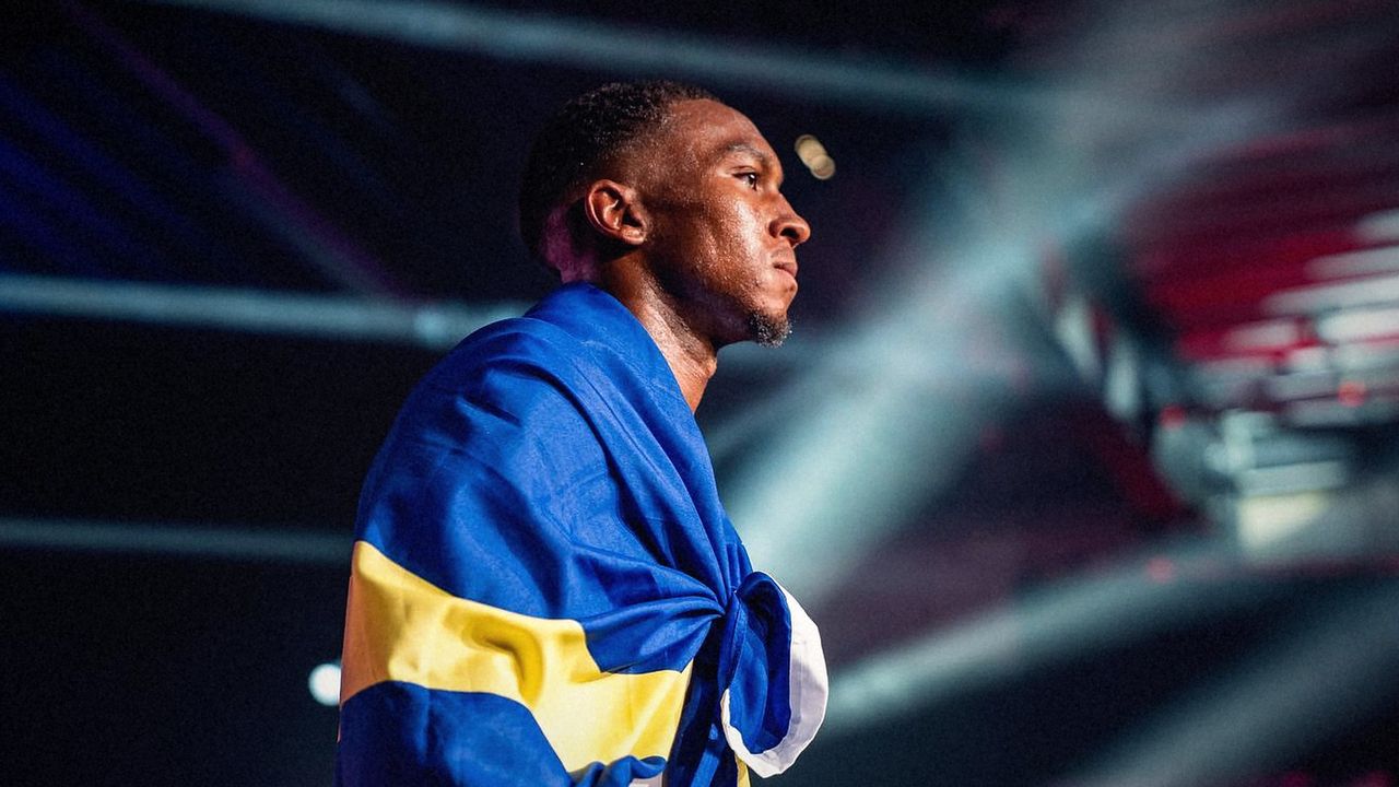 Fighter with his flag over his shoulders during the walk-out, WFL 2021